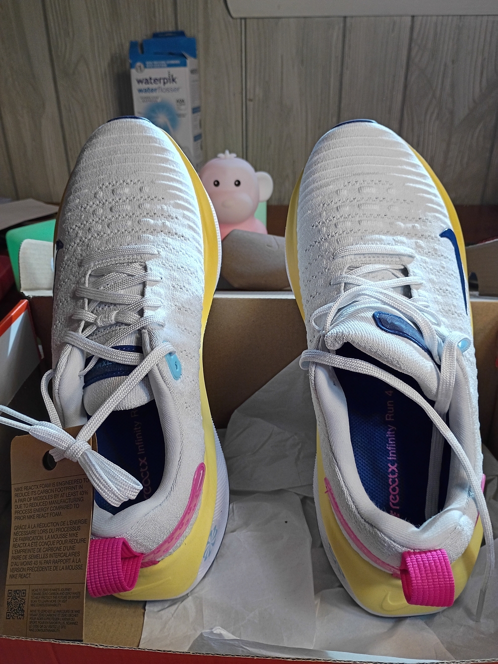 Nike Women's White Sneakers with Yellow Soles and Pink Heel Tabs
